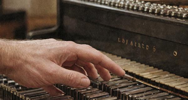 Professional piano tuning with precision tools